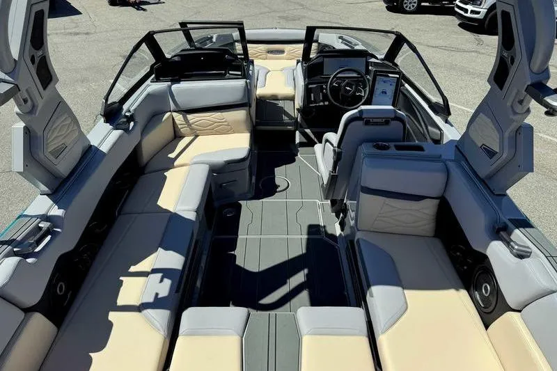 Slide: The Image of 2026 Supra SA boat interior with luxurious seating and modern dashboard design. - 4