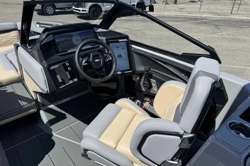 Slide: The Image of 2026 Supra SA boat interior with modern dashboard and comfortable seating. - 9