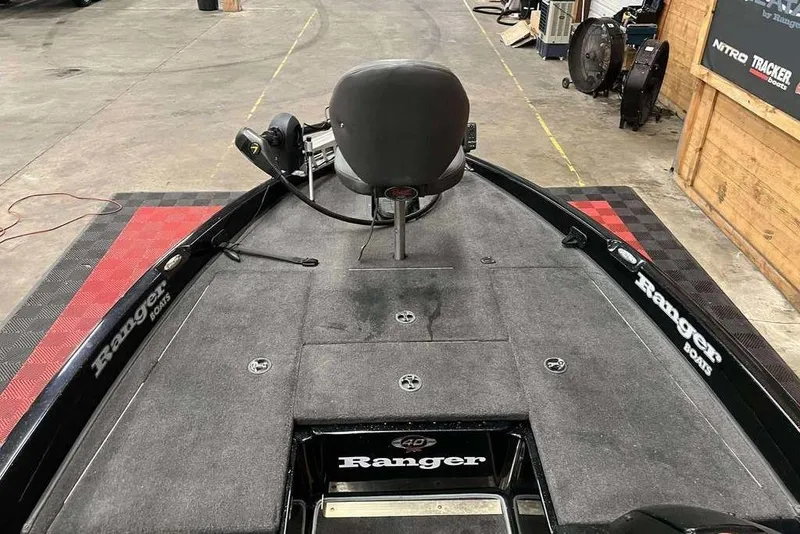 Slide: The Image of 2008 Ranger 188VX Comanche boat interior with fishing seat and carpeted deck. - 7