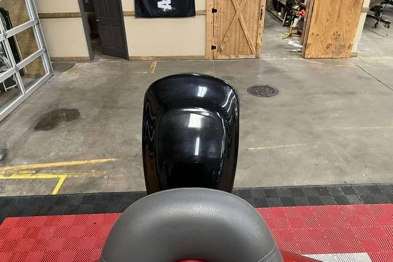 Slide: The Image of 2008 Ranger 188VX Comanche boat seat in a garage setting. - 9