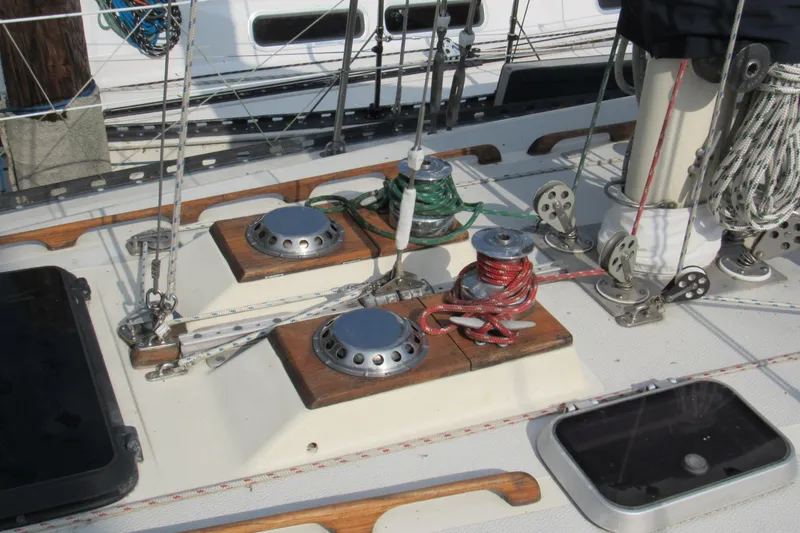 Slide: The Image of Deck of 1976 Tartan 3800 sailboat with winches and rigging details. - 12