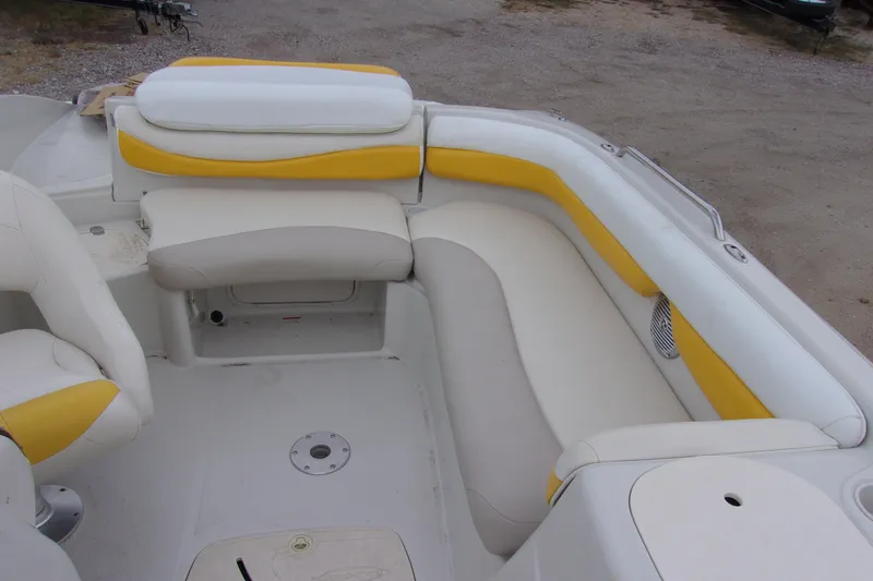 Slide: The Image of 2009 Tahoe 195 I/O boat interior with white and yellow seating. - 10