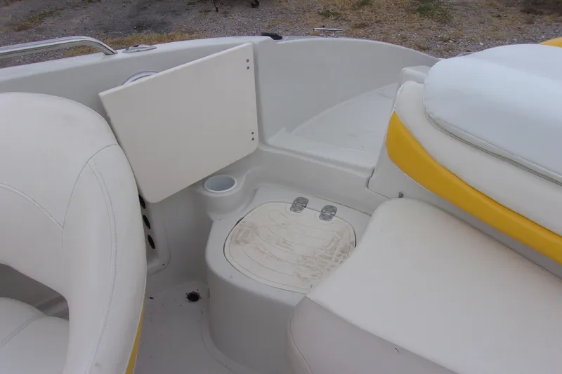 Slide: The Image of Interior of 2009 Tahoe 195 I/O boat with white and yellow seating. - 12