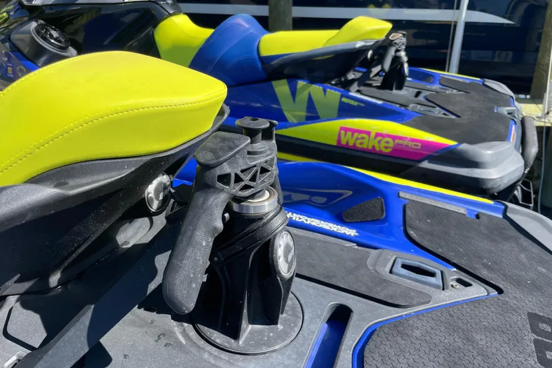 Slide: The Image of 2020 Sea-Doo Wake Pro 230 jet ski with vibrant yellow and blue design. - 6