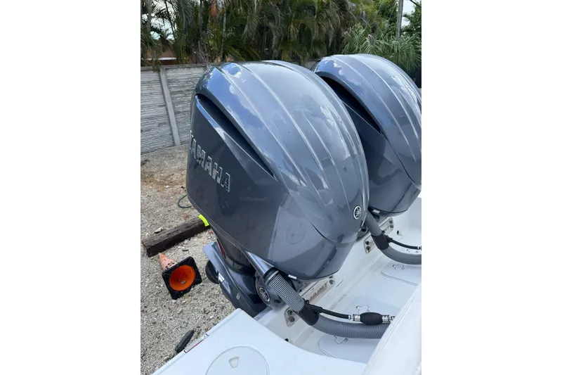 Slide: The Image of Twin Yamaha outboard engines on a 2023 Sea Hunt Gamefish 27 Forward Seating boat. - 10