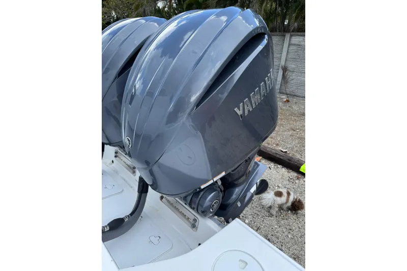 Slide: The Image of Twin Yamaha outboard engines on a 2023 Sea Hunt Gamefish 27 boat. - 14