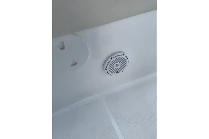 Slide: The Image of 2023 Sea Hunt Gamefish 27 boat interior with speaker detail. - 16