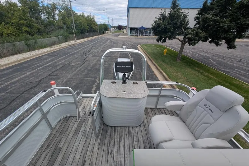 Slide: The Image of 2021 Qwest LS 822 DS Bar pontoon boat with seating and control console. - 14