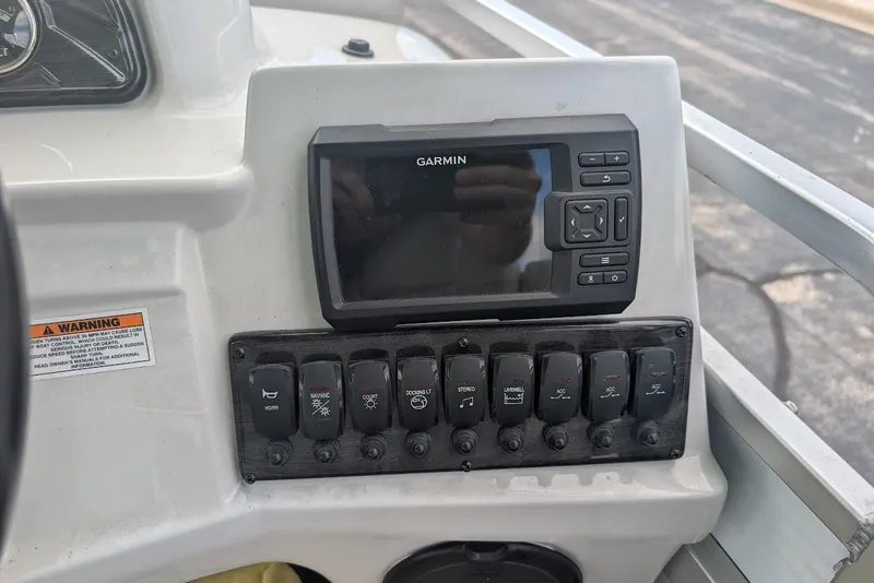 Slide: The Image of Control panel of a 2021 Qwest LS 822 DS Bar boat with Garmin display. - 20