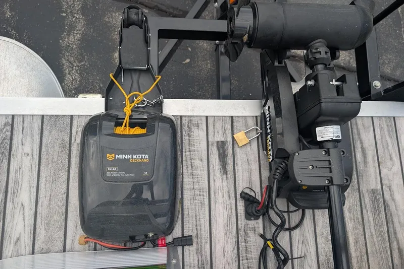 Slide: The Image of Minn Kota Deckhand and motor on 2021 Qwest LS 822 DS Bar boat deck. - 27