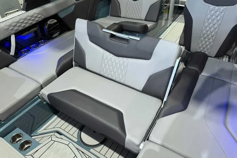 Slide: The Image of 2026 MasterCraft XT23 interior with luxurious gray seating and modern design elements. - 2