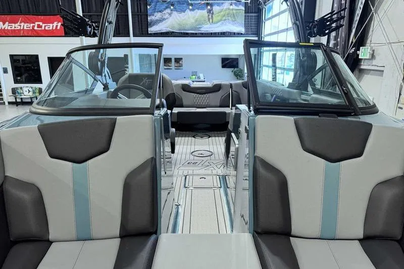 Slide: The Image of Interior of 2026 MasterCraft XT23 boat, featuring sleek seating and modern design elements. - 22