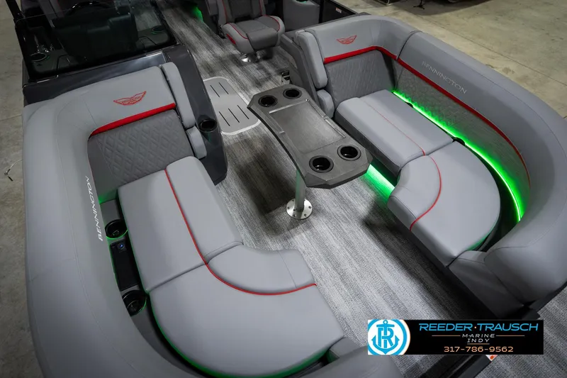 Slide: The Image of Luxurious interior of 2026 Bennington 22 MFB pontoon boat with LED lighting and plush seating. - 12
