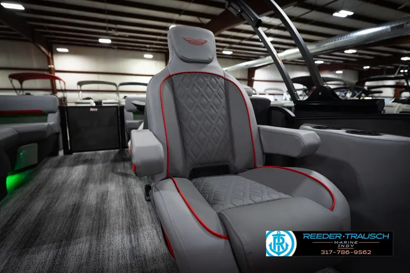 Slide: The Image of Luxurious seating on 2026 Bennington 22 MFB boat with elegant design and red accents. - 24