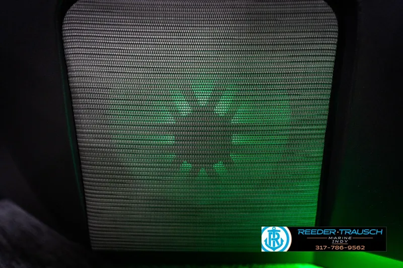 Slide: The Image of Speaker grille with green lighting on a 2026 Bennington 22 MFB boat. - 45