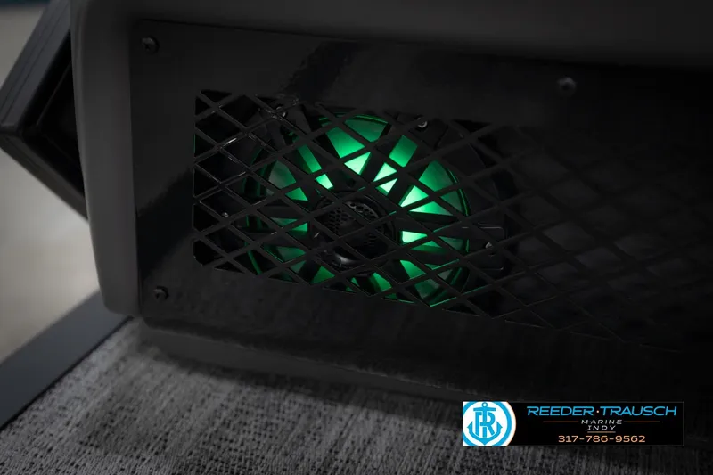 Slide: The Image of Green-lit speaker on 2026 Bennington 22 MFB boat, Reeder Trausch Marine logo visible. - 46