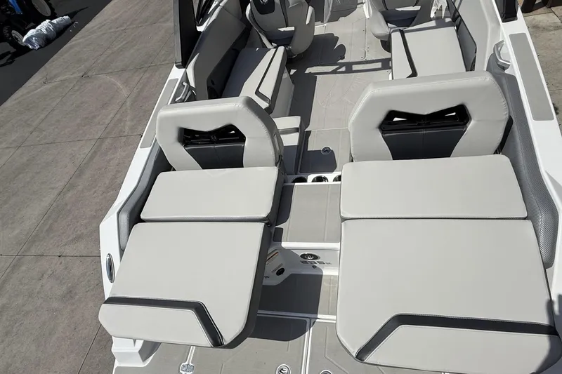 Slide: The Image of 2026 Scarab 235 SE boat interior with modern seating and sleek design. - 10