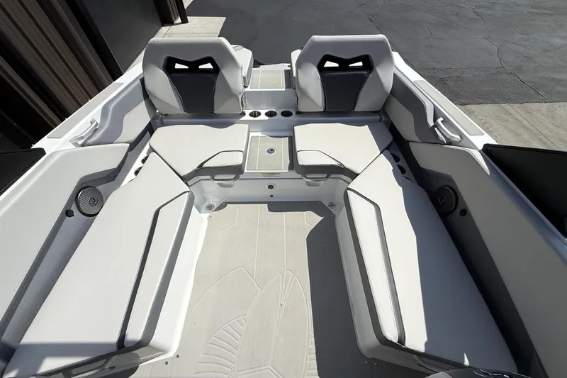 Slide: The Image of 2026 Scarab 235 SE boat interior with sleek seating and modern design. - 12