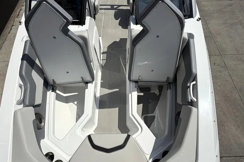Slide: The Image of 2026 Scarab 235 SE boat interior with modern seating and sleek design. - 8