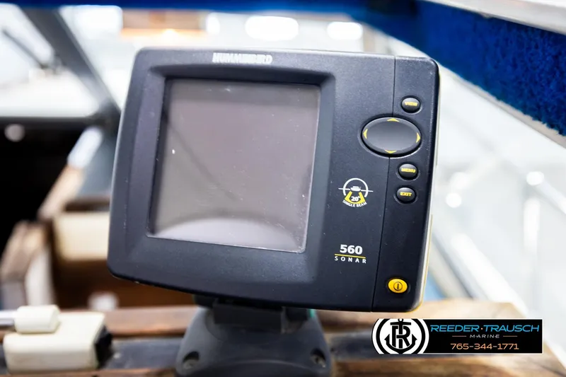 Slide: The Image of Sonar device on 1977 Searay 220 OV boat dashboard, Reeder-Trausch Marine branding visible. - 37