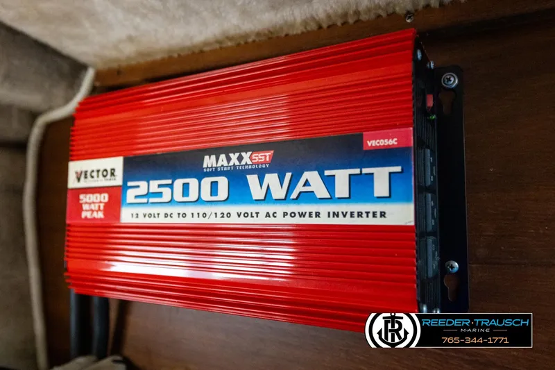 Slide: The Image of Red 2500-watt power inverter installed on a 1977 Searay 220 OV boat. - 46