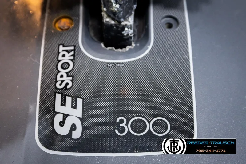 Slide: The Image of SE Sport 300 hydrofoil on 1977 Searay 220 OV boat, Reeder-Trausch Marine logo visible. - 56