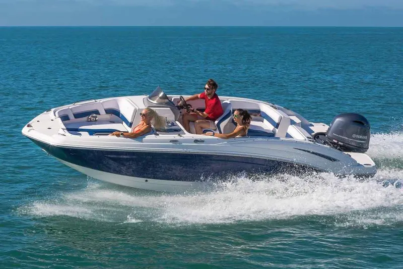 Slide: The Image of Manufacturer Provided Image: 2018 Chaparral 191 Suncoast boat cruising on open water. - 23