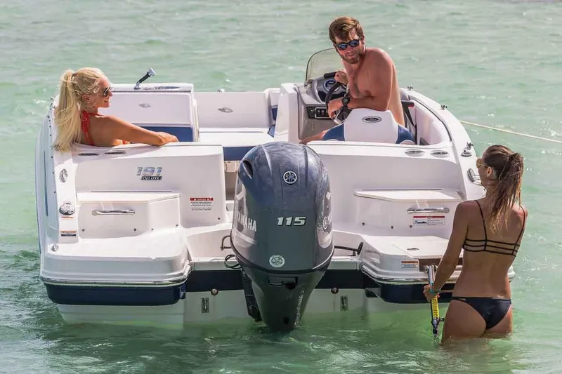 Slide: The Image of Manufacturer Provided Image: 2018 Chaparral 191 Suncoast boat with people enjoying water activities. - 24