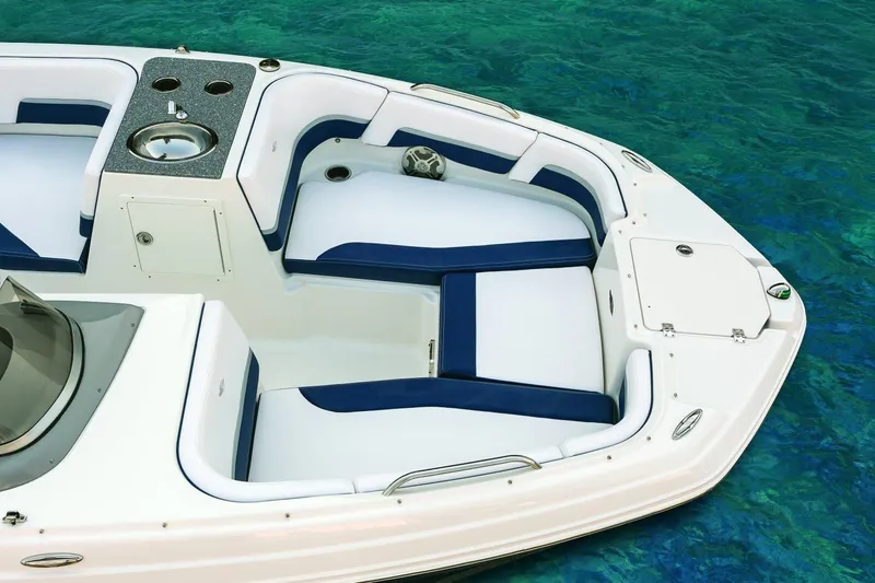 Slide: The Image of Manufacturer Provided Image: 2018 Chaparral 191 Suncoast boat interior with cushioned seating and storage compartments. - 25
