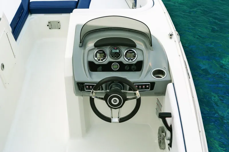 Slide: The Image of Manufacturer Provided Image: 2018 Chaparral 191 Suncoast boat dashboard and steering wheel. - 26