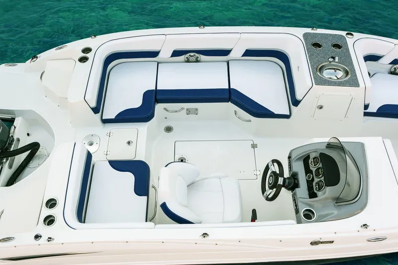 Slide: The Image of Manufacturer Provided Image: 2018 Chaparral 191 Suncoast boat interior with white and blue seating. - 27