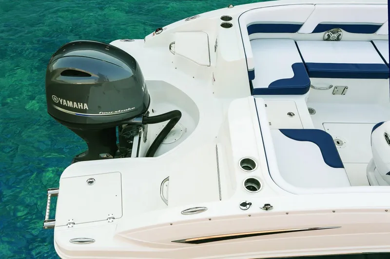 Slide: The Image of Manufacturer Provided Image: 2018 Chaparral 191 Suncoast boat with Yamaha outboard motor on clear water. - 29