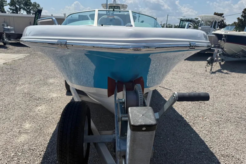Slide: The Image of 2017 Tidewater 196 DC Explorer boat on trailer, parked outdoors. - 10
