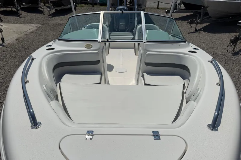 Slide: The Image of 2017 Tidewater 196 DC Explorer boat with spacious seating and sleek design. - 11