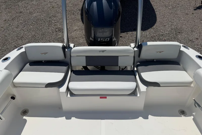 Slide: The Image of 2017 Tidewater 196 DC Explorer boat interior with seating and Yamaha 150 engine. - 15