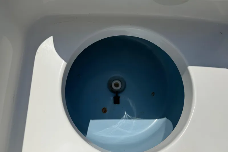 Slide: The Image of Close-up of a Tidewater 196 DC Explorer 2017 boat's livewell interior. - 16