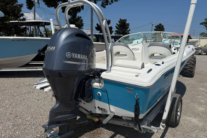Slide: The Image of 2017 Tidewater 196 DC Explorer boat with Yamaha 150 engine, parked on a trailer. - 6