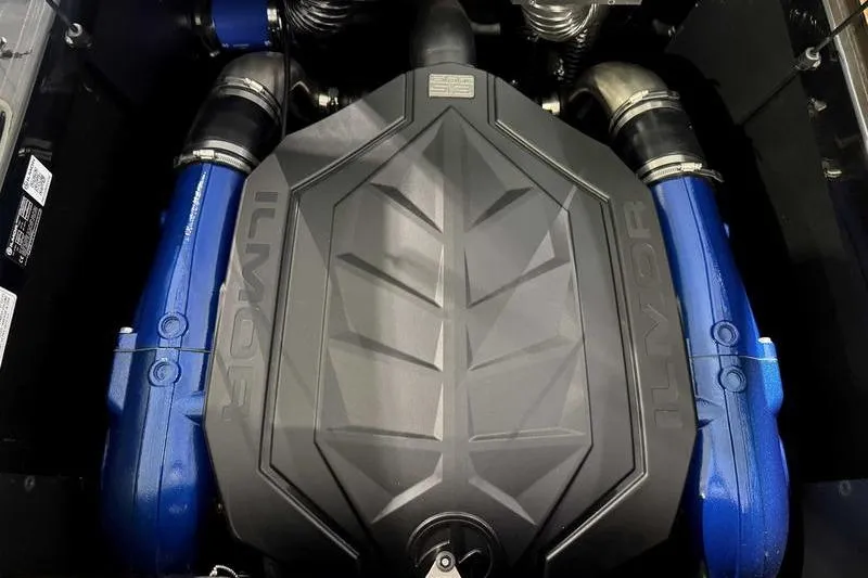 Slide: The Image of 2026 MasterCraft NXT22 engine with Ilmor branding, featuring blue components and sleek design. - 3