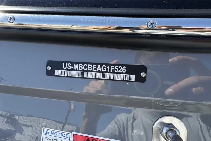 Slide: The Image of 2026 MasterCraft NXT22 boat with visible hull identification number. - 4