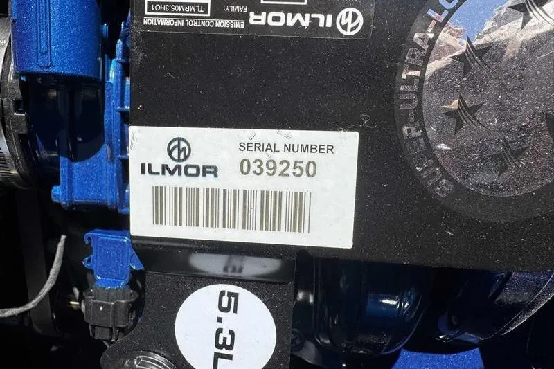 Slide: The Image of Close-up of Ilmor engine serial number 039250 on 2026 MasterCraft NXT22. - 8