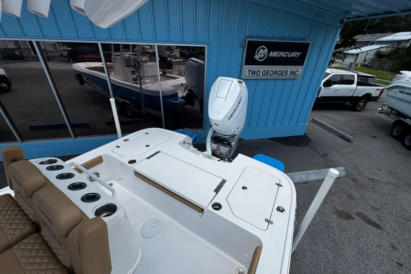 Slide: The Image of 2026 Caymas 28 HB boat with Mercury engine at Two Georges Inc. dealership. - 13