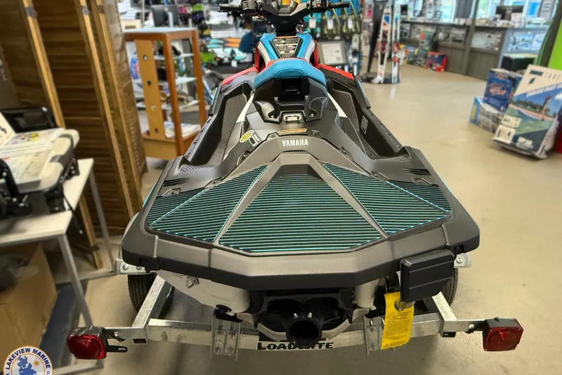 Slide: The Image of 2025 Yamaha WaveRunner JetBlaster DLX 2-Up on display in a showroom. - 4