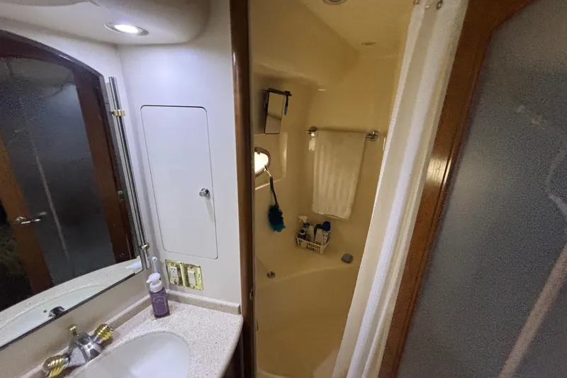 Slide: The Image of Bathroom interior of 1998 Carver 530 Voyager Pilothouse yacht, featuring sink and shower. - 29