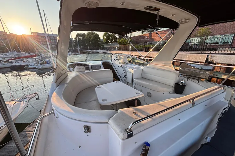 Slide: The Image of 1998 Carver 530 Voyager Pilothouse yacht interior at sunset in marina. - 47