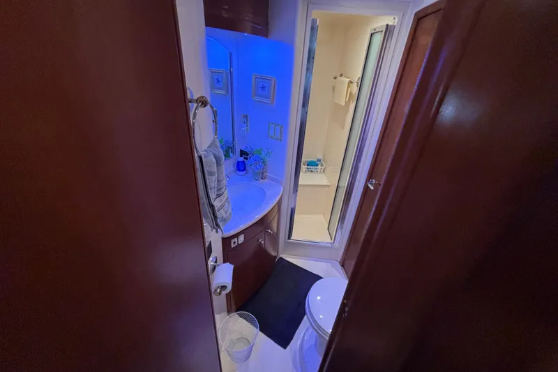 Slide: The Image of Bathroom interior of 1998 Carver 530 Voyager Pilothouse with shower and blue lighting. - 6