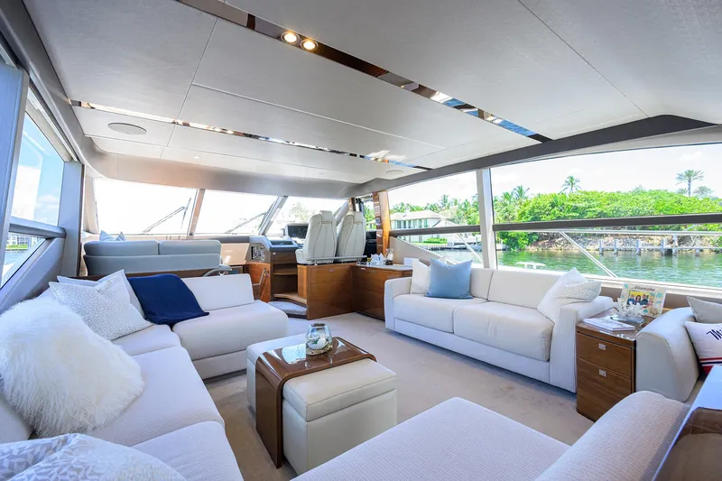Slide: The Image of Luxurious 2020 Princess F70 yacht interior with elegant seating and panoramic windows. - 1