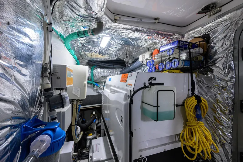 Slide: The Image of Engine room of a 2020 Princess F70 yacht with equipment and insulation. - 101