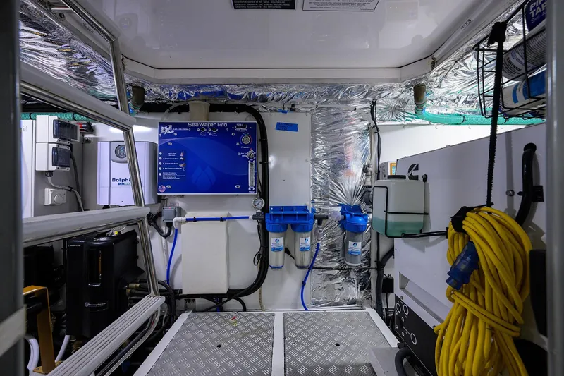 Slide: The Image of Engine room of a 2020 Princess F70 yacht with water filtration system and equipment. - 103