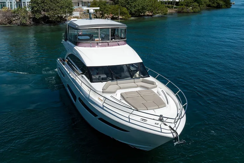 Slide: The Image of Luxurious 2020 Princess F70 yacht cruising in clear blue waters. - 15