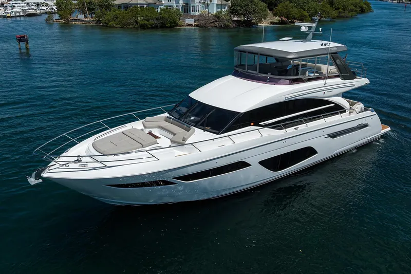 Slide: The Image of Luxury 2020 Princess F70 yacht cruising on clear blue water. - 16